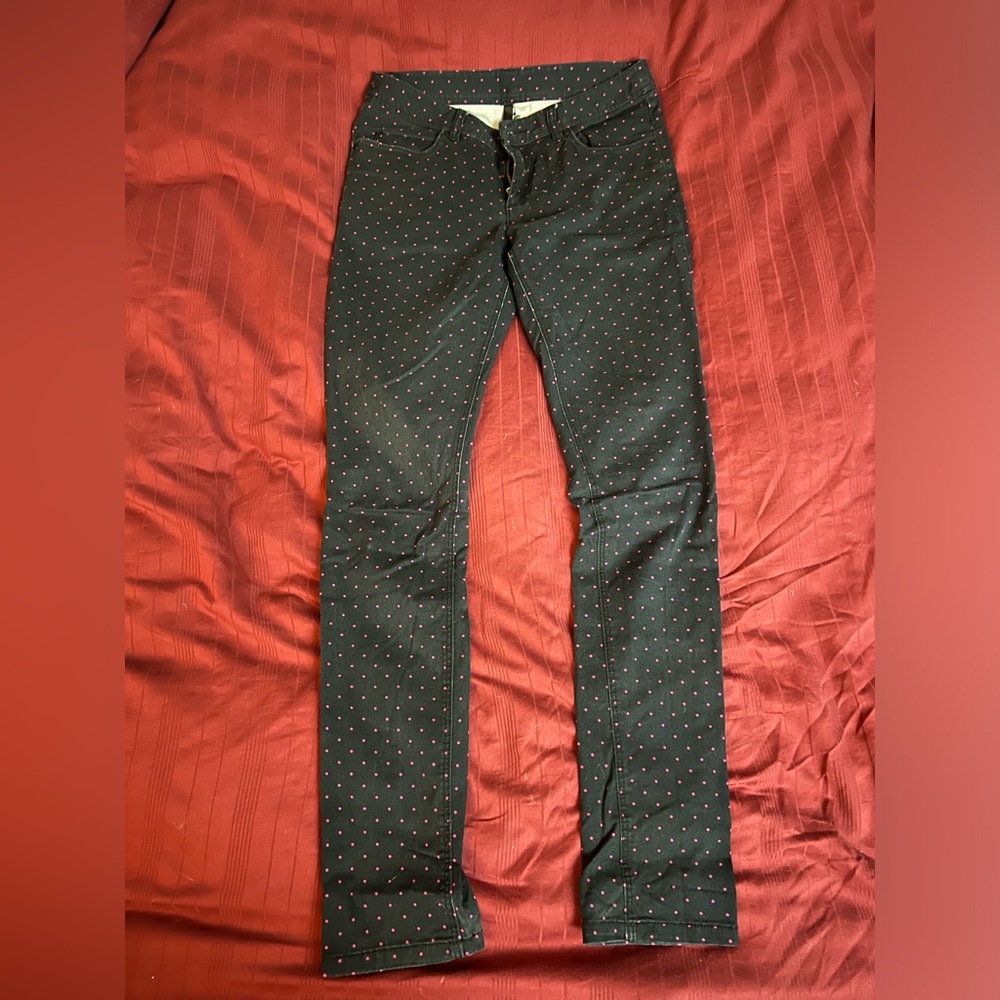 Black stretchy pants with pink polka dots
